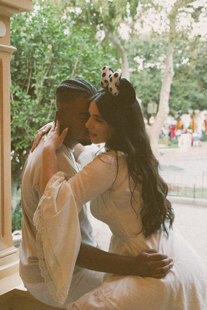 fiance kissing her fiance on the cheek