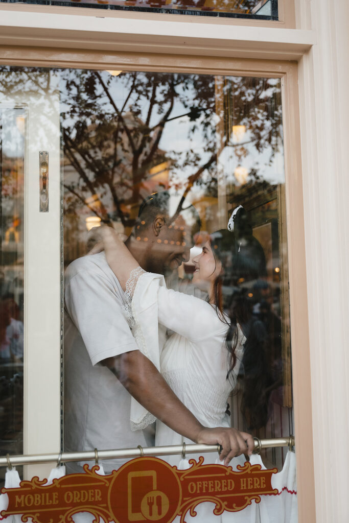 newly engaged couple looking at each other 