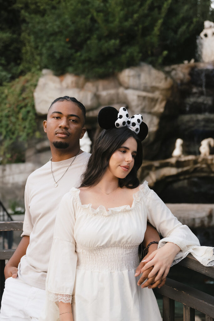 engaged couple at their dream engagement session at disneyland 