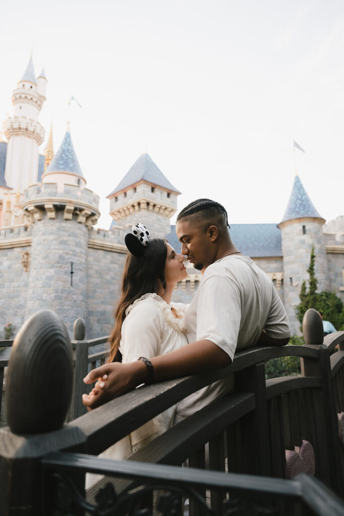 newly engaged couple looking at each other