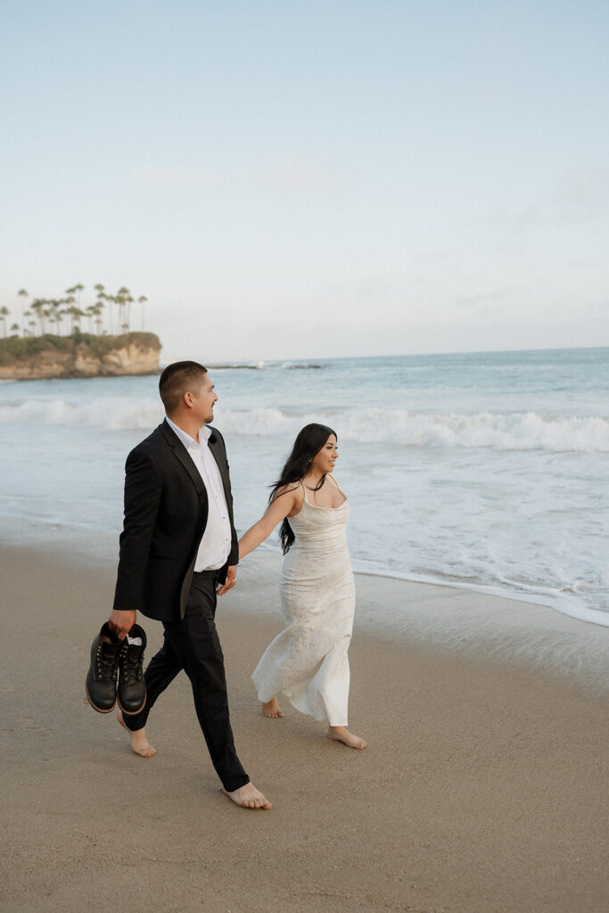 cute newlyweds portrait at the beach 