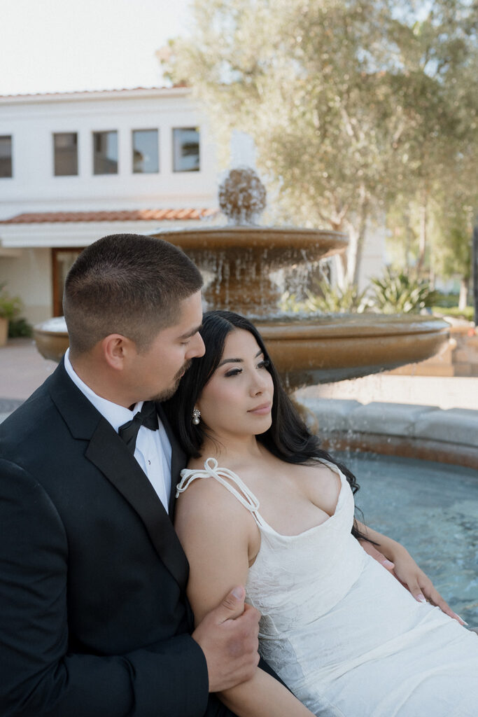 bride and groom hugging 