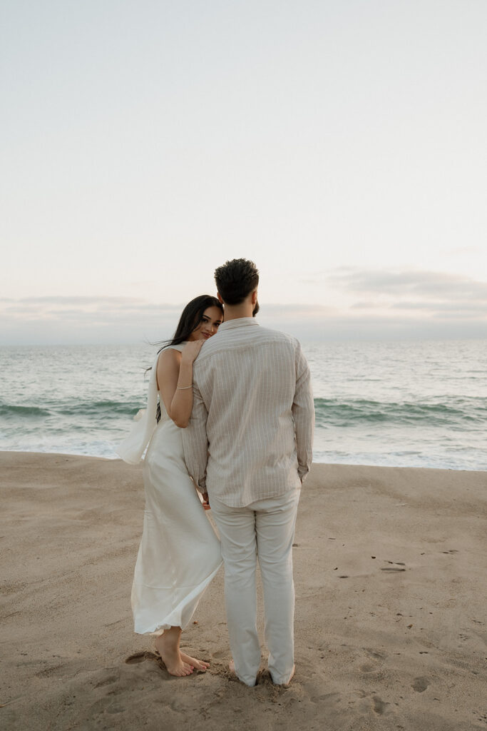 couple at the beach during their photoshoot