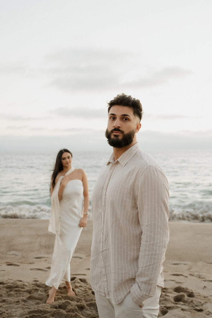 couple posing for the camera during their photoshoot