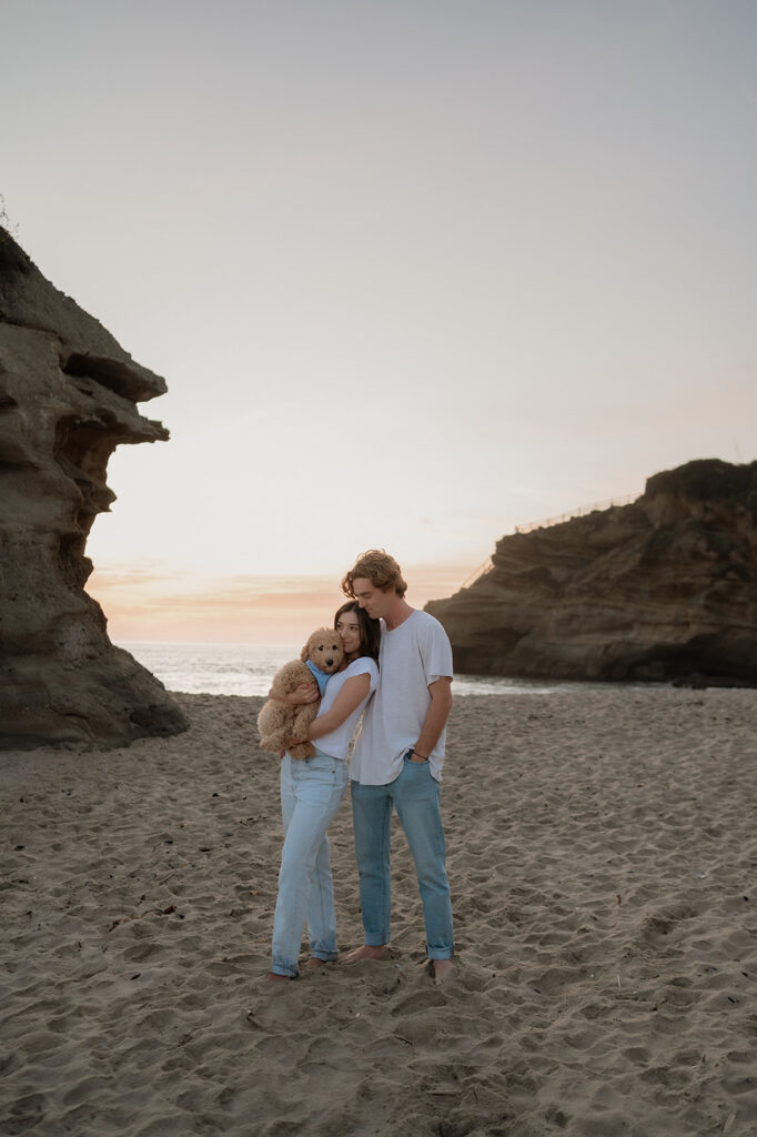 cute couple posing for the camera during their photoshoot