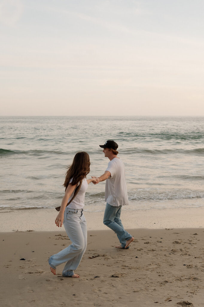 couple dancing at the beach 