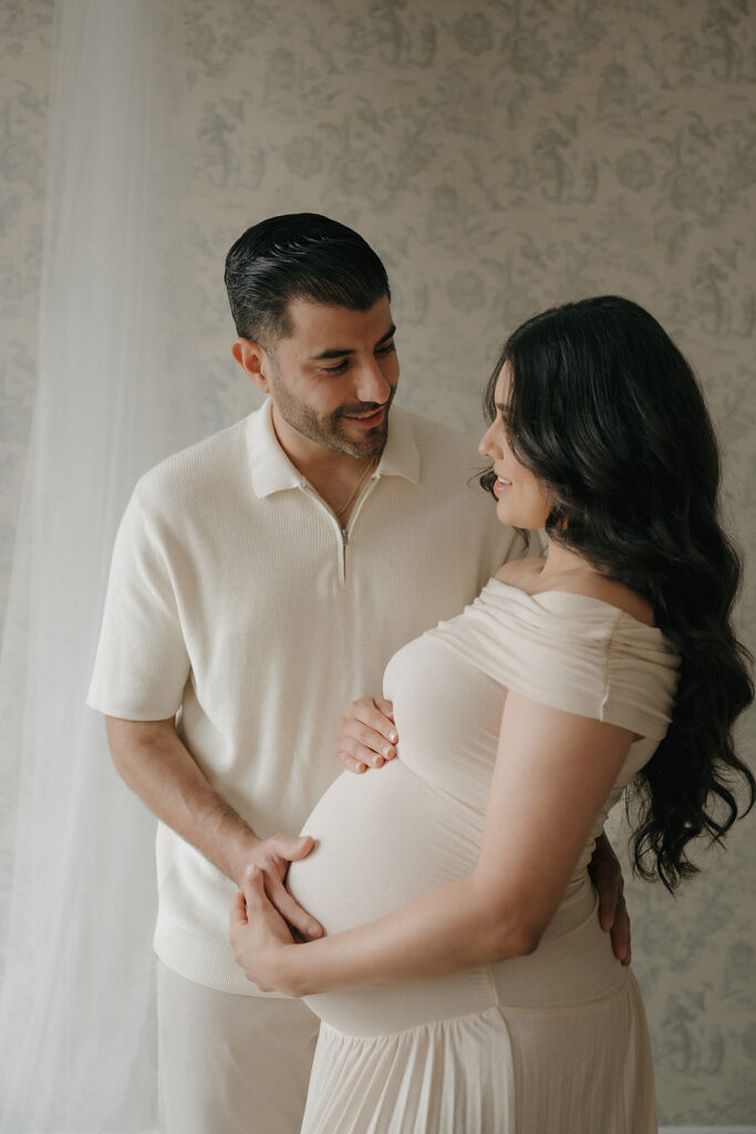 happy soon to be parents at their maternity photoshoot