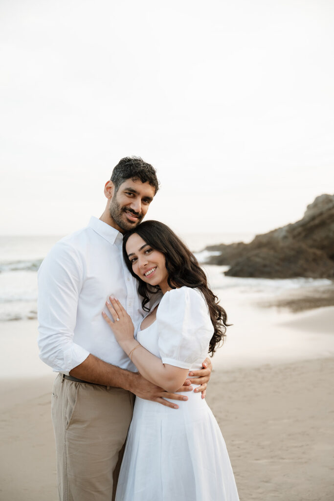cute couple posing for the camera during their proposal