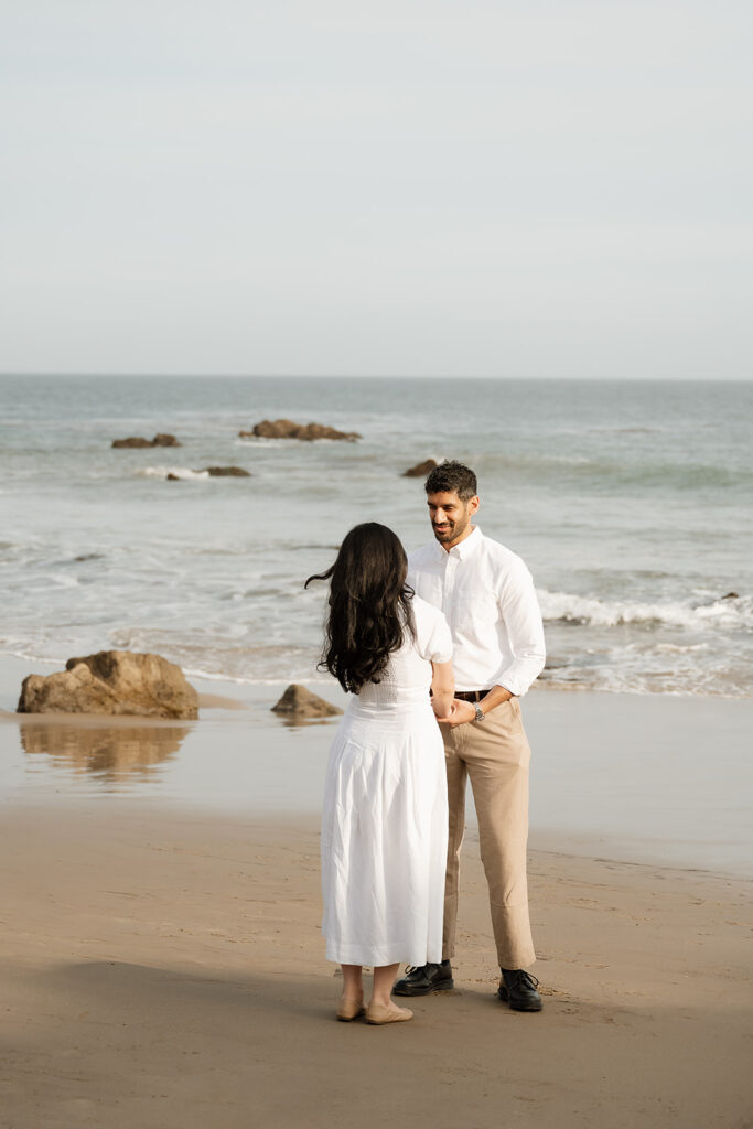 cute couple at their dream photoshoot at the beach
