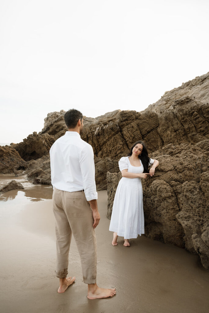 cute couple looking at each other during their photoshoot