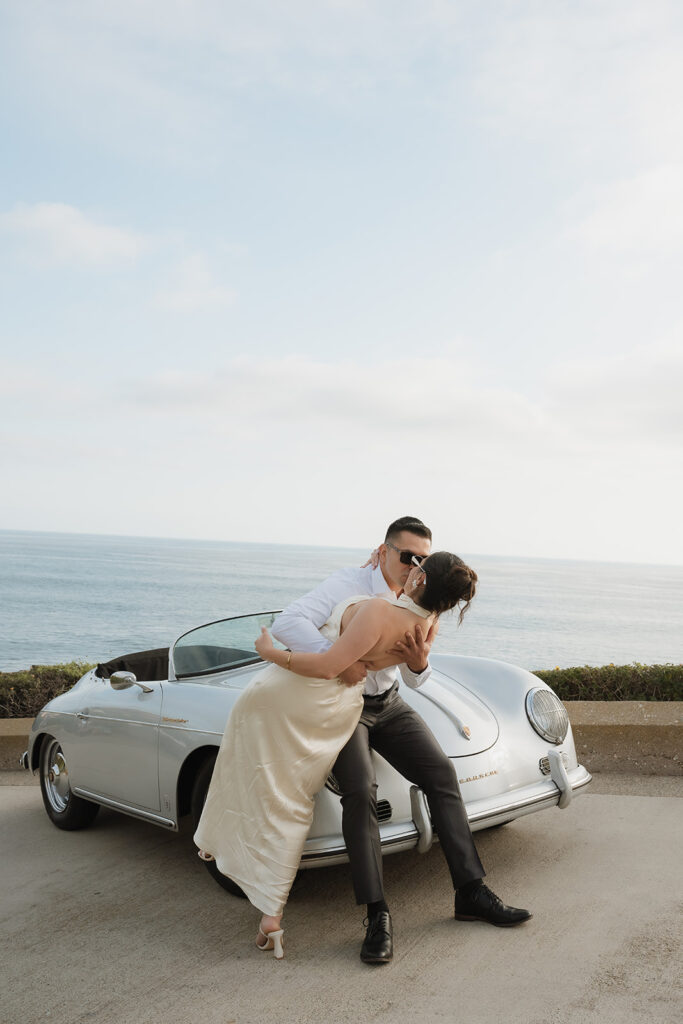 picture of the newly engaged couple kissing during their photoshoot