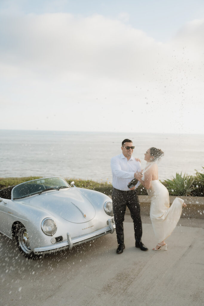 couple celebrating their elopement with champagne 