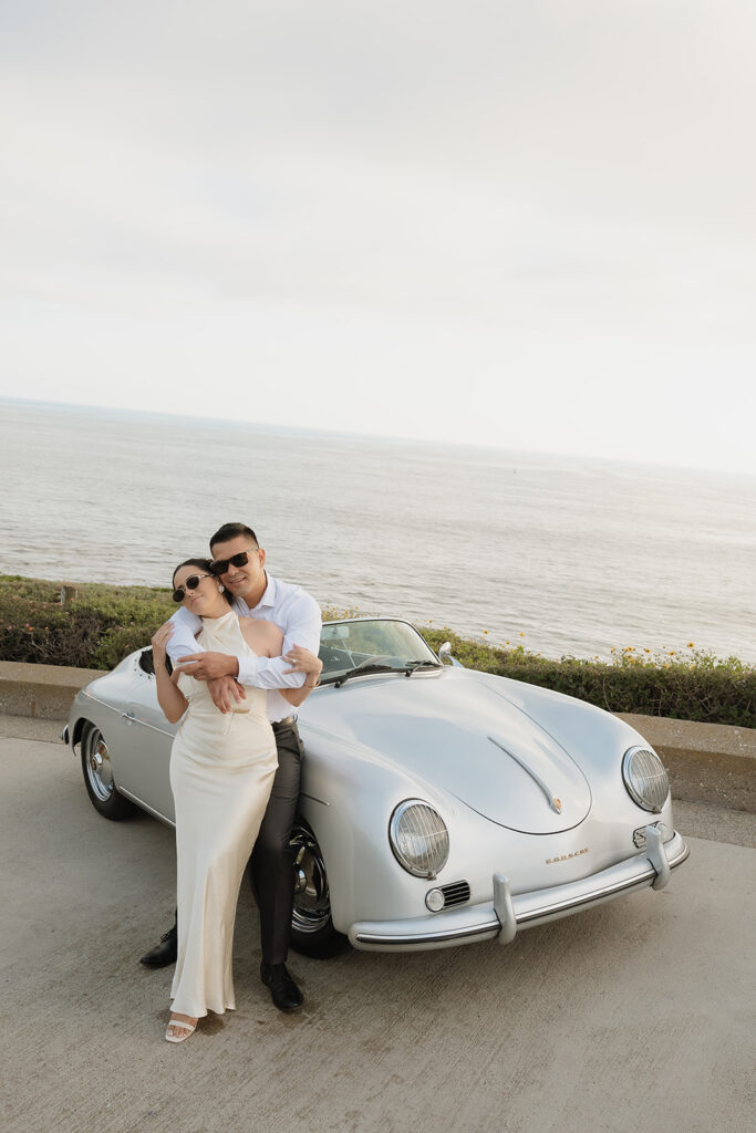 newly engaged couple hugging during their engagement photoshoot