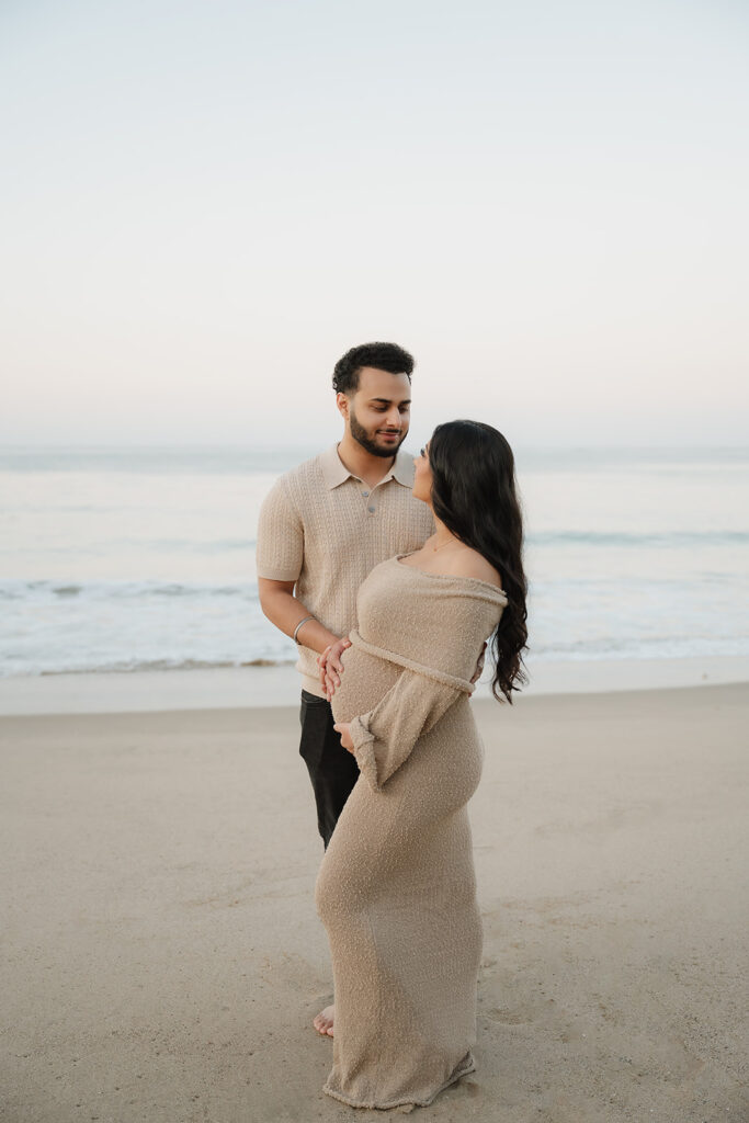 cute couple at their photoshoot in laguna beach