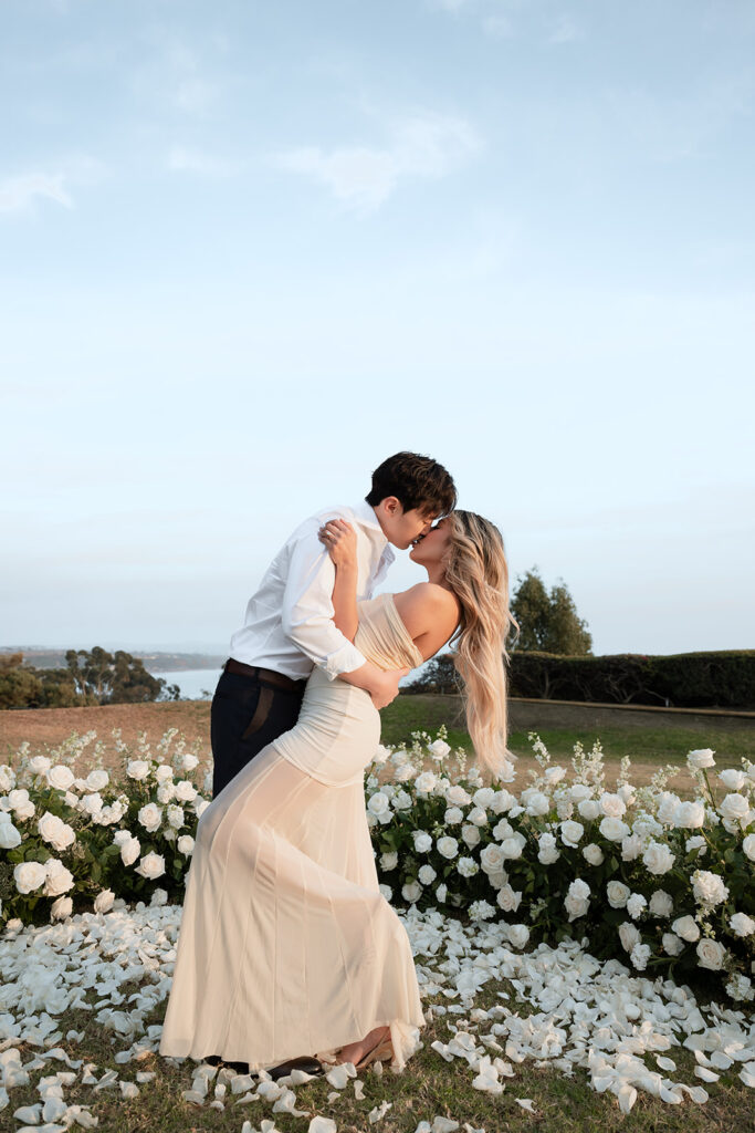 newly engaged couple kissing during their engagement session