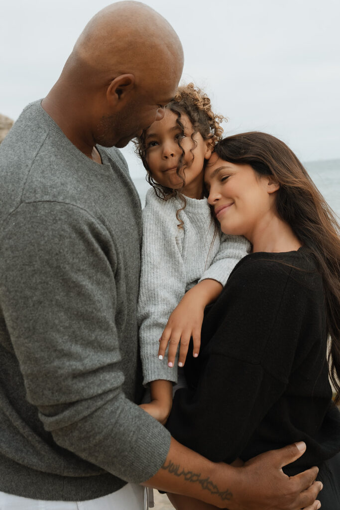 happy couple at their dream photoshoot at the beach  