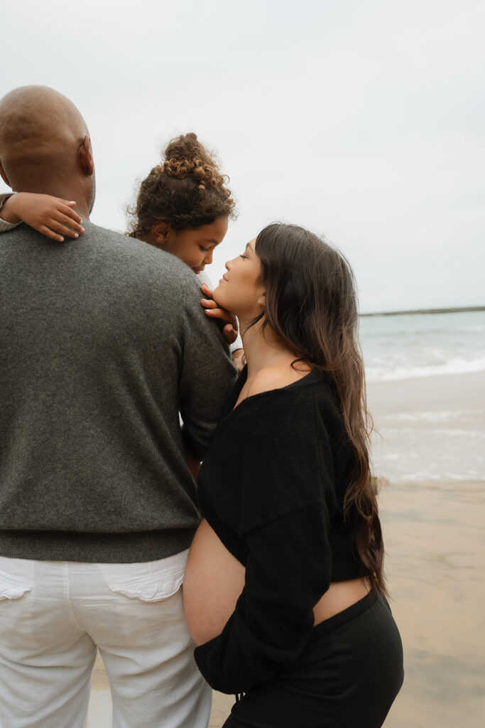 This Cloudy Beach Maternity Shoot Proves Gloomy Days Are Golden