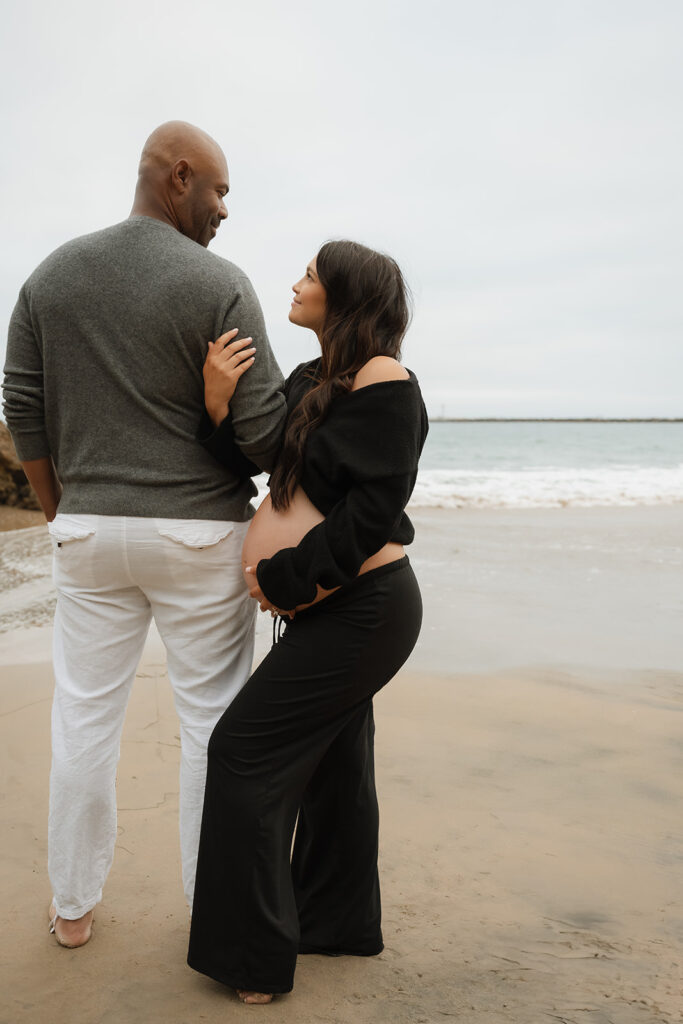 cute couple looking at each other during their session