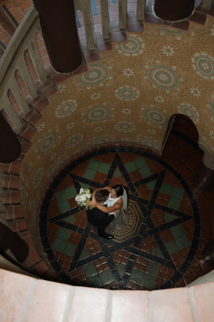 cute picture of the newlyweds dancing during their bridal photos
