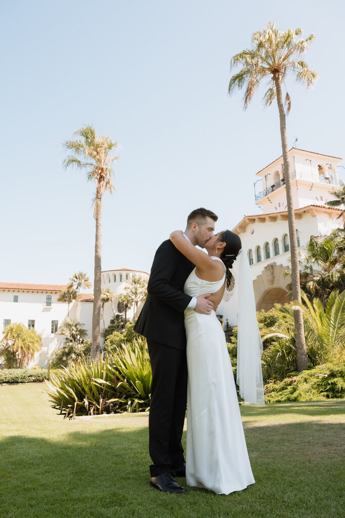 bride and groom kissing after their elopement ceremony