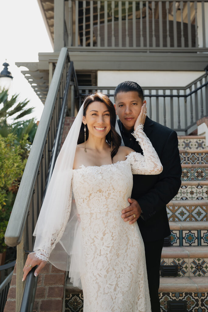 Bride and groom laughing with each other