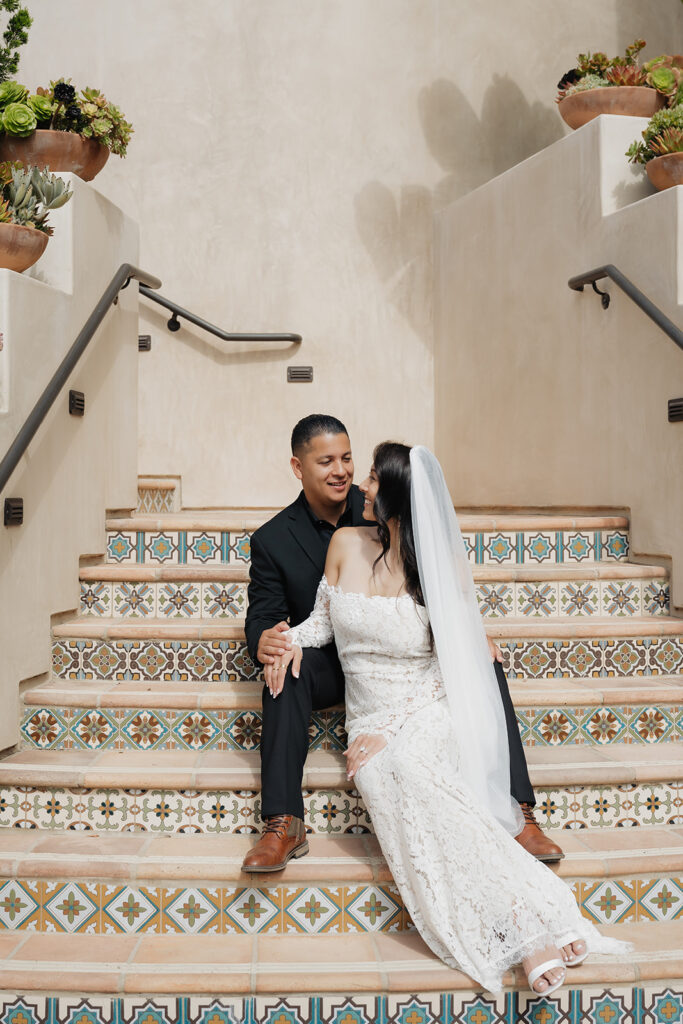 Cute picture of the bride and groom, smiling at each other
