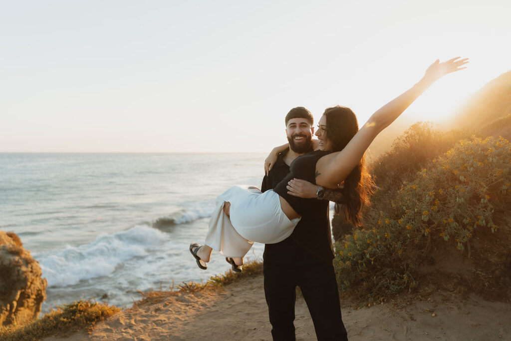 cute couple dancing during their photoshoot