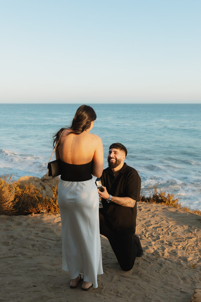 cute couple smiling at their dream engagement