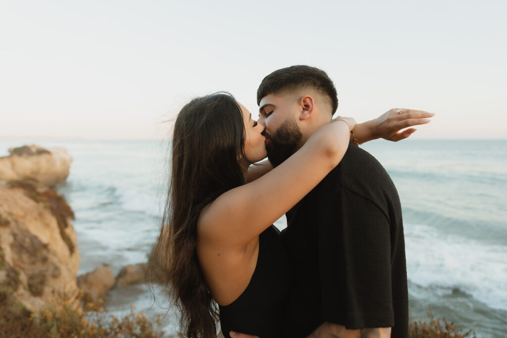 portrait of the couple kissing during their photoshoot